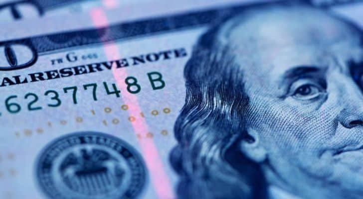 Security thread glowing on a $100 bill 