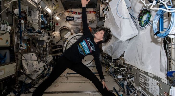Samantha Cristoforetti performing yoga while in space