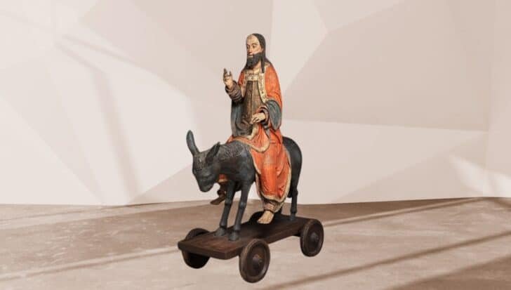 A statue depicting a Jesus riding a donkey on Palm Sunday, located at The Metropolitan Museum of Arts